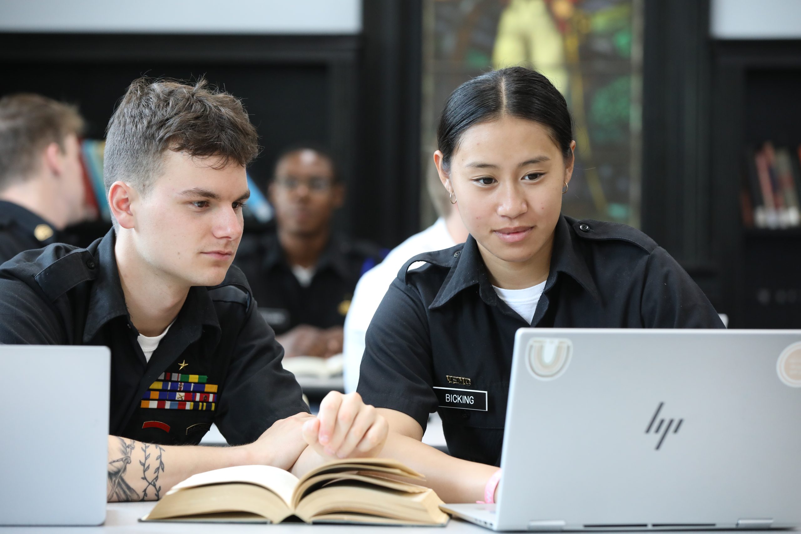 College students looking at computer