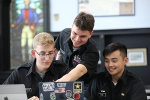 College cadets with laptops